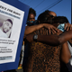 Debra Ray, the aunt of Dijon Kizzee, is hugged after speaking to protesters gathered at a makeshift memorial on September 1, 2020 in Los Angeles, at the location where Dijon Kizzee was shot and killed the previous day by Los Angeles Sheriff’s Deputies.